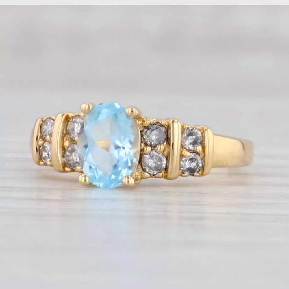 Stunning 1.25ctw Oval Blue Topaz Diamond Ring 14k Yellow Gold Size 6.25